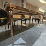 Rose Gold Metal Dining Table with Dark Polished Stone Top and Sculptural Cabriole Legs
